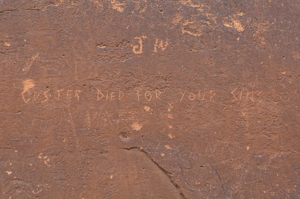 Sand Island petroglyph graffiti