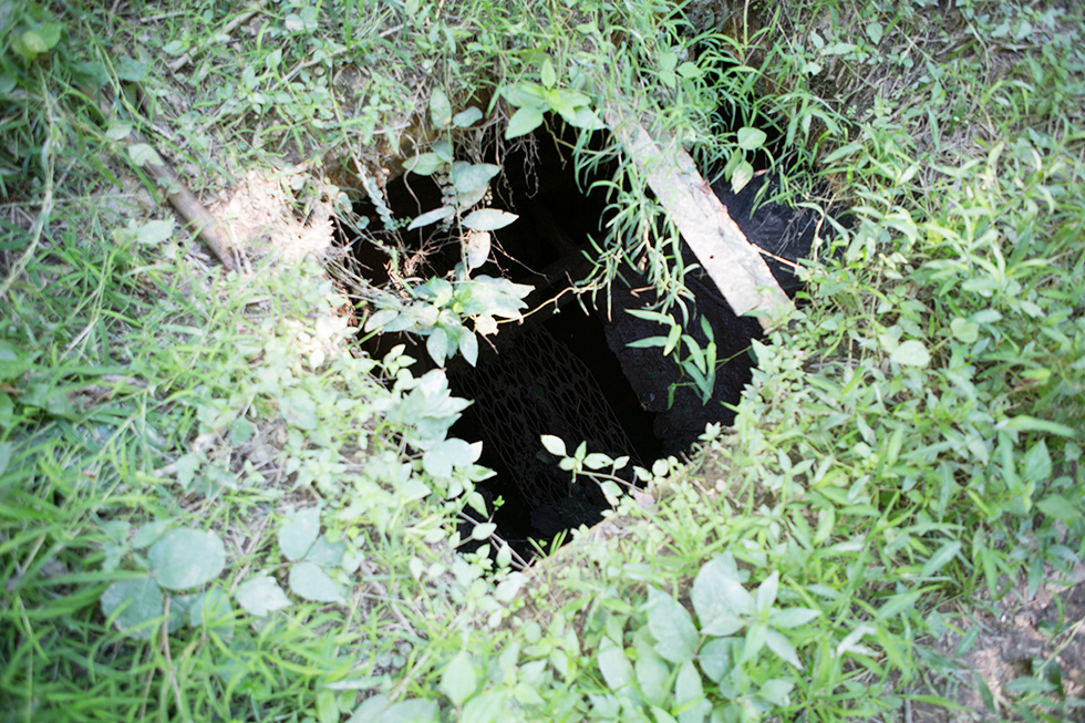 Hole in deck of abandoned shipwreck