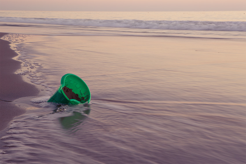 A child's lost bucket at Crystal Cove