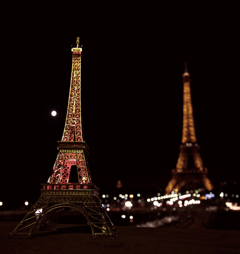 Dueling Eiffel Towers and a full moon