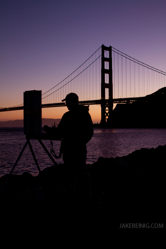 Artist Michael Feldman, painting the cliffs towards Battery Yates.