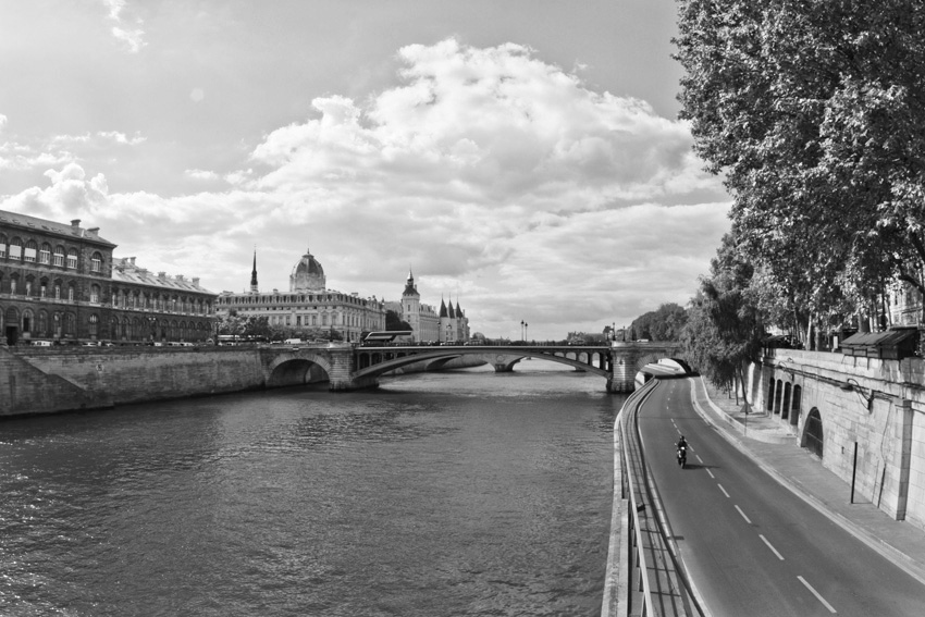 Lone motorcyclist on the Seine